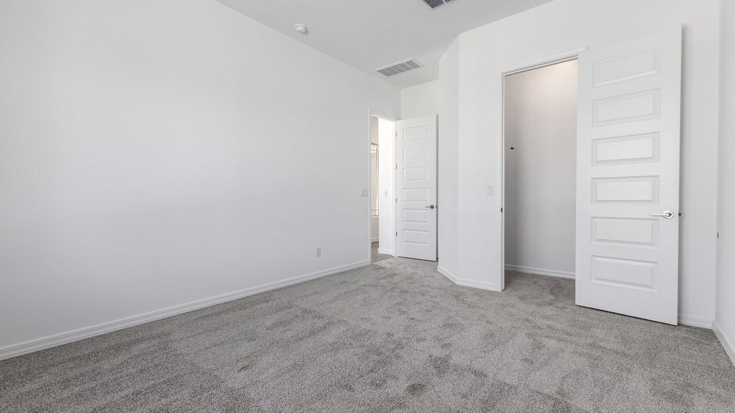 Furnished interior view inside a new home in Windrose, Waddell (Image 19).