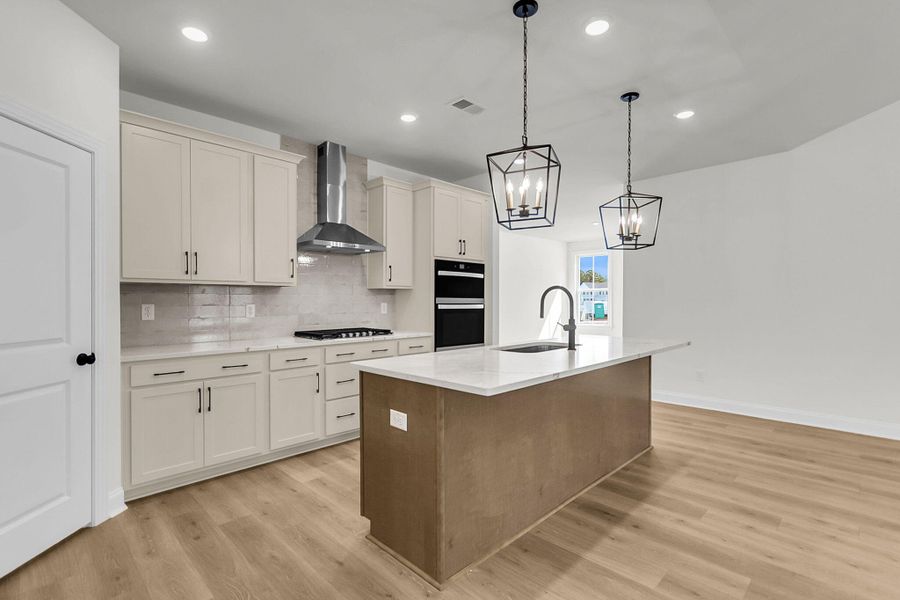Furnished interior view inside a new home in Tidewater at Lakes of Cane Bay, Summerville (Image 9).