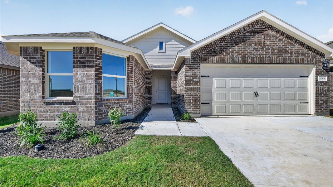 Front exterior of a new home in The Hills at Reunion, Newark, TX, highlighting curb appeal (Image 20).
