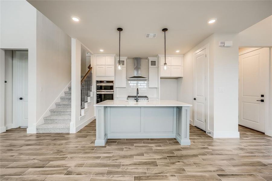 Island, Pantry, Double Oven, Gas Range.... A chef's dream!