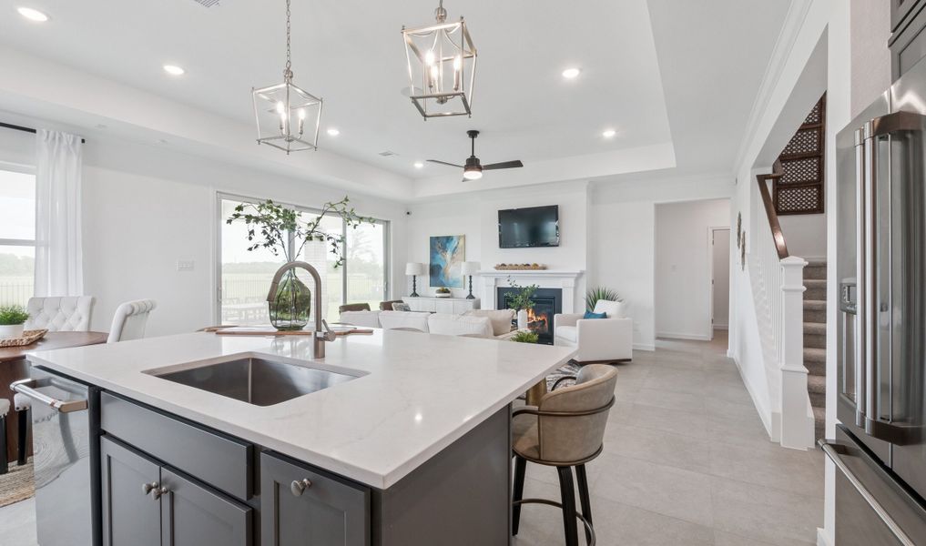 Kitchen includes central island with space for prep & dining Kitchen includes central island with space for prep & dining