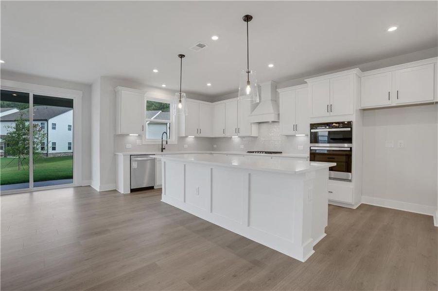 Furnished interior view inside a new home in The Paddocks at Doc Hughes, Buford (Image 7).
