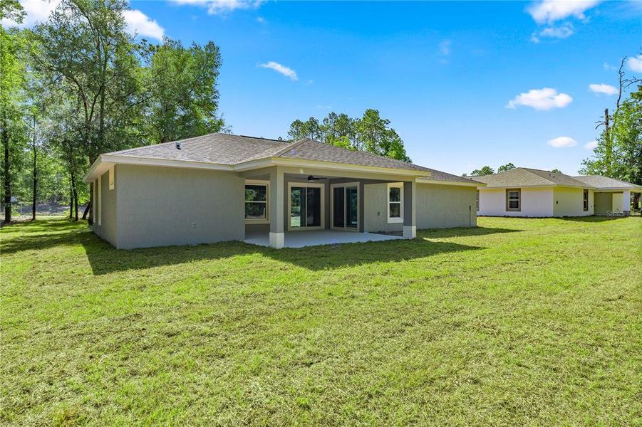 Exterior details and patio area of a home in , Dunnellon (Image 18).