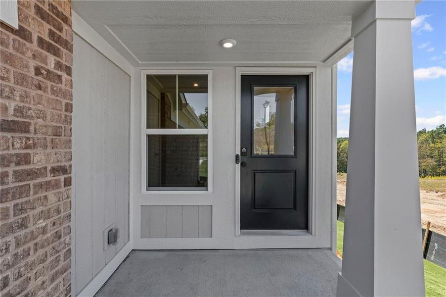 Exterior details and patio area of a home in Villas at Gold Creek, Dawsonville (Image 21).