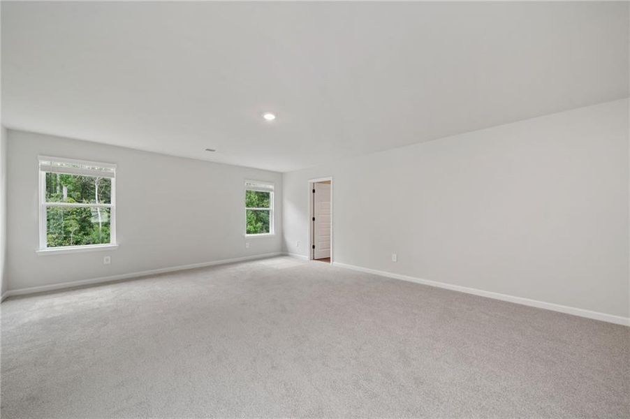 Spacious, unfurnished interior of a new home in Vines at Mill Creek - Estate Series, Braselton (Image 24).