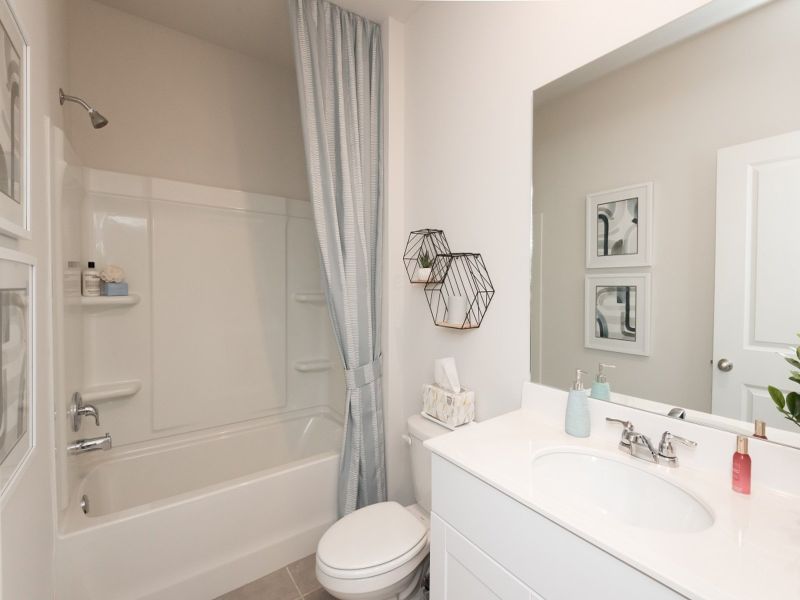 Secondary bathroom in the Paisley at a Meritage Homes community in Holly Springs, GA.