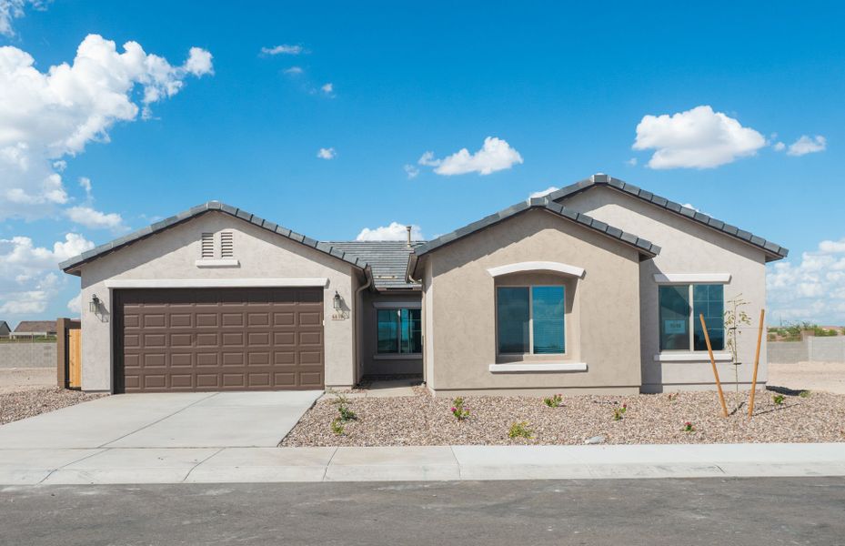 Front exterior of a new home in Parkside at Anthem at Merrill Ranch, Florence, AZ, highlighting curb appeal (Image 2).