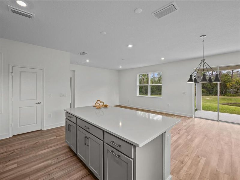 View from the kitchen to the dining and living room