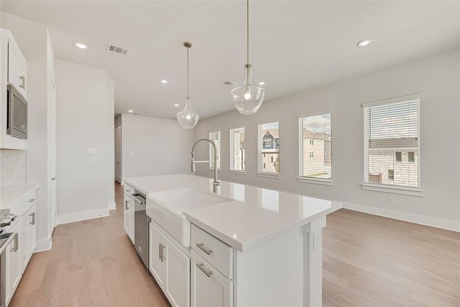 Furnished interior view inside a new home in Collin Creek, Plano (Image 7).