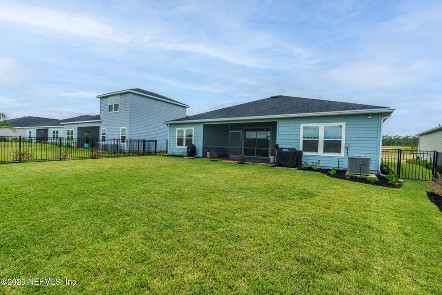 Exterior details and patio area of a home in Edenbrooke at Hyland Trail | 55+: Edenbrooke at Hyland Trail 60s, Green Cove Springs (Image 1). Exterior details and patio area of a home in Edenbrooke at Hyland Trail | 55+: Edenbrooke at Hyland Trail 60s, Green Cove Springs (Image 1).