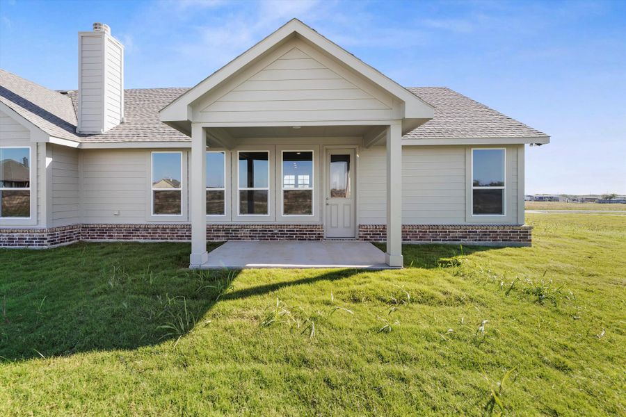 Exterior details and patio area of a home in Clear Sky Addition, Valley View (Image 32).
