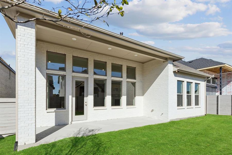 Dining al fresco is in your future on this spacious covered back patio!
