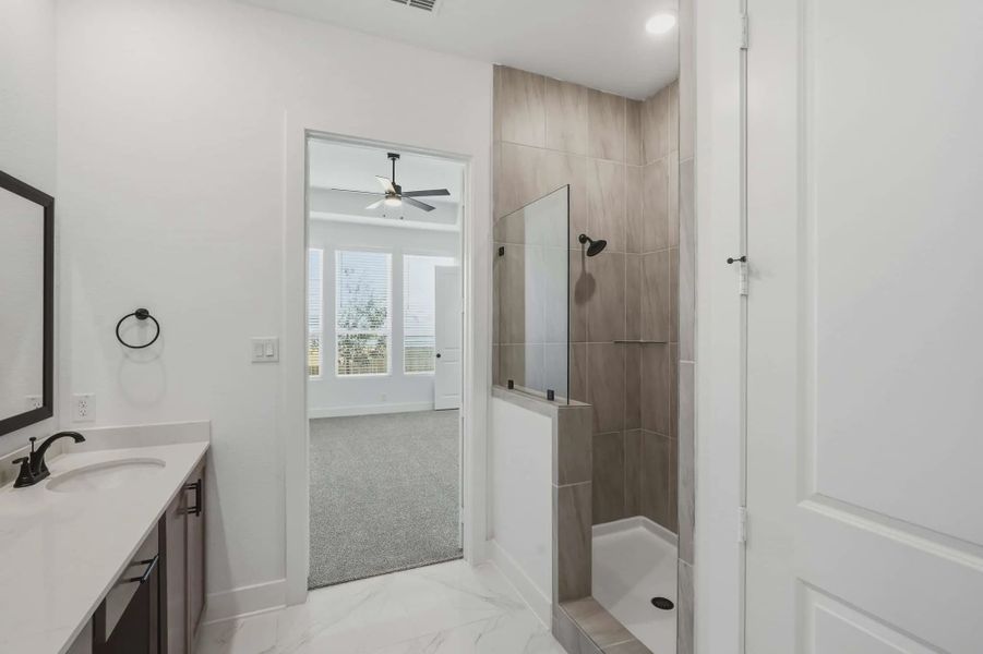 Representative furnished interior of a home built from the Talos by Chesmar Homes in Prominence Urban, San Antonio (Image 6).