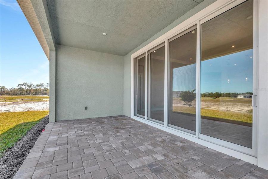 Exterior details and patio area of a home in The Reserve at Victoria, Deland (Image 3).