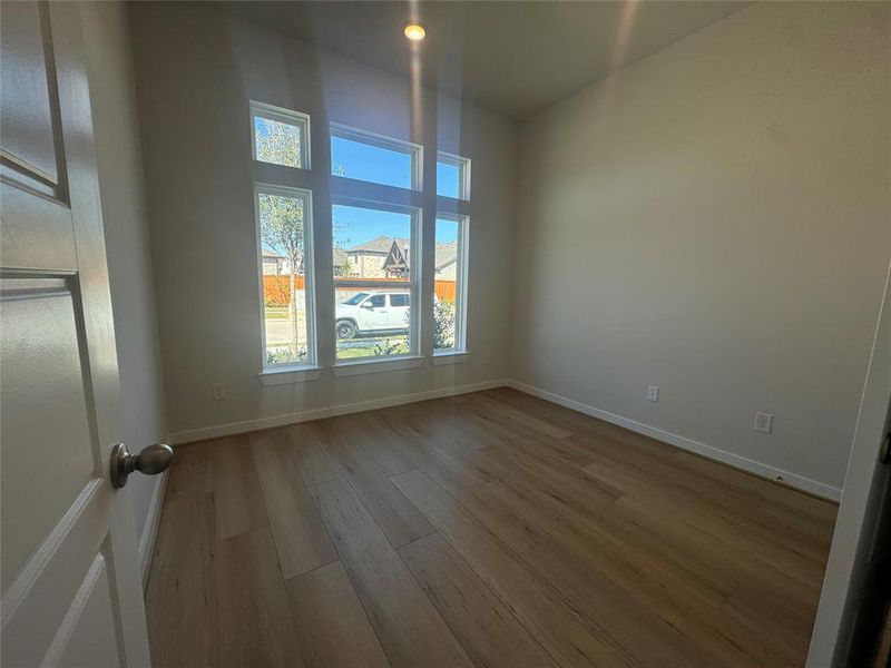 Large secondary bedroom with tons of natural light.