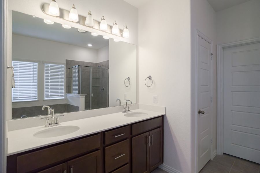 Furnished interior view inside a new home in The Villages of Hurricane Creek, Anna (Image 12).