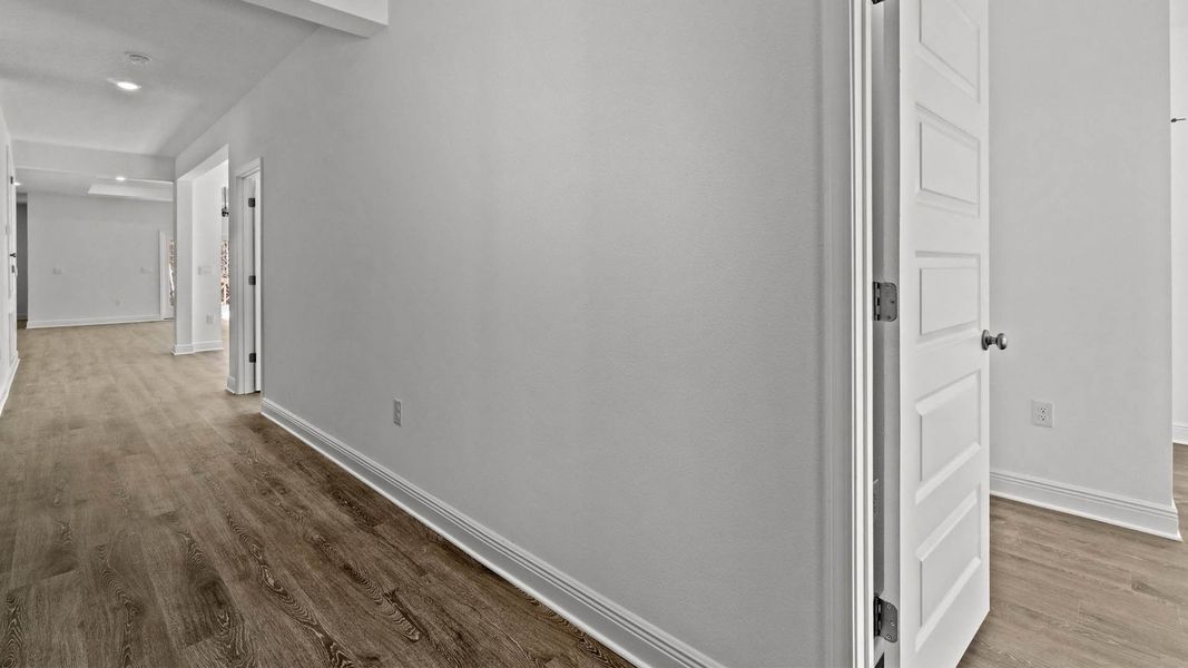 Representative unfurnished interior of a home built from the Camden by D.R. Horton in Owl's Head Farms, Freeport (Image 12).