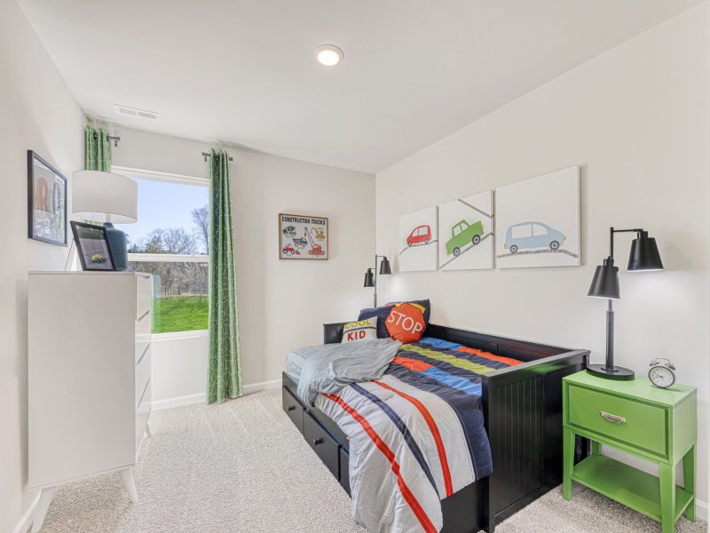 Secondary bedroom in the Amber floorplan at a Meritage Homes community in Graham, NC.