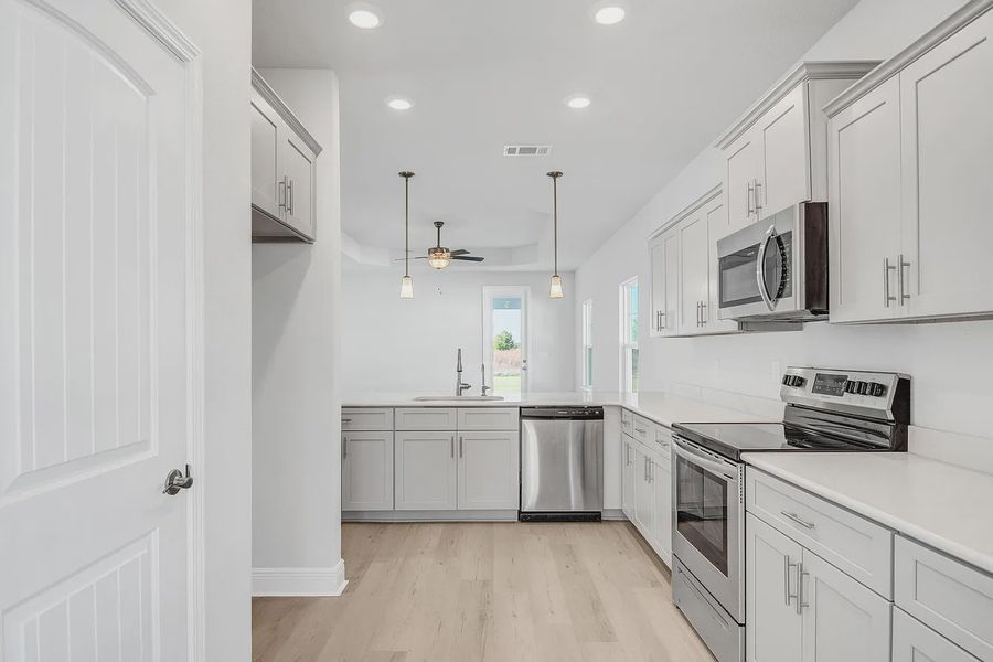 Furnished interior view inside a new home in The Bluffs at Lafayette, Freeport (Image 4).