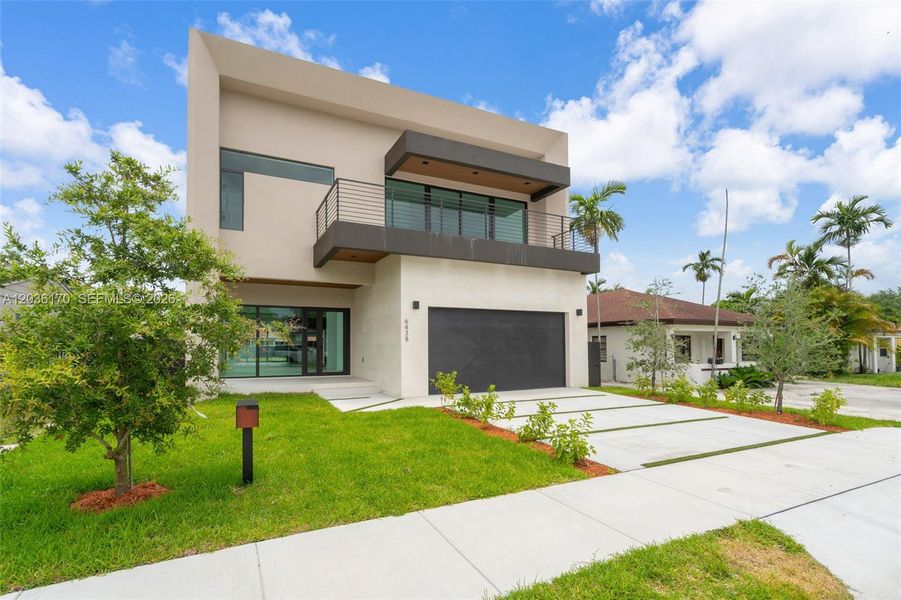 Front exterior of a new home in , Miami, FL, highlighting curb appeal (Image 22). Front exterior of a new home in , Miami, FL, highlighting curb appeal (Image 22).