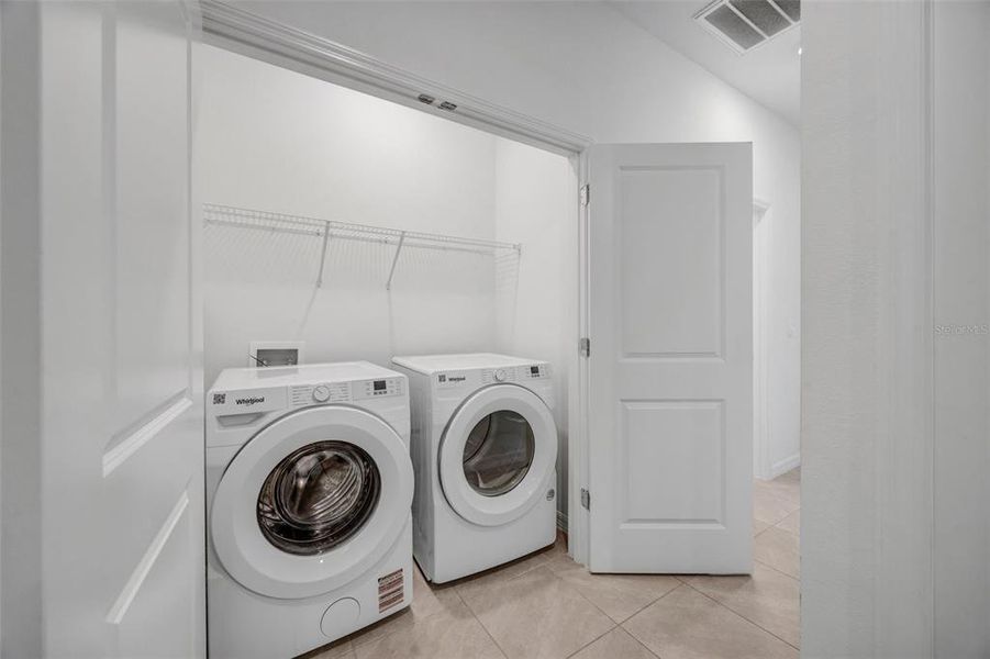 Furnished interior view inside a new home in Woodcreek, Wesley Chapel (Image 5).