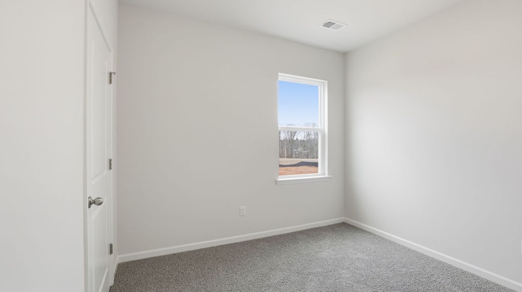 Spacious, unfurnished interior of a new home in Waverly Station, Greenwood (Image 19).