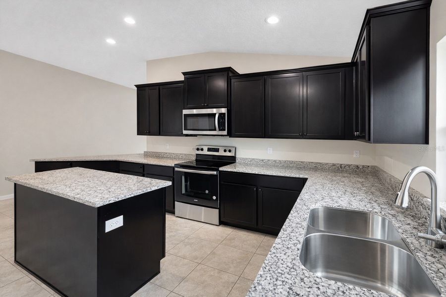 Furnished interior view inside a new home in Harmony Central, St. Cloud (Image 4).
