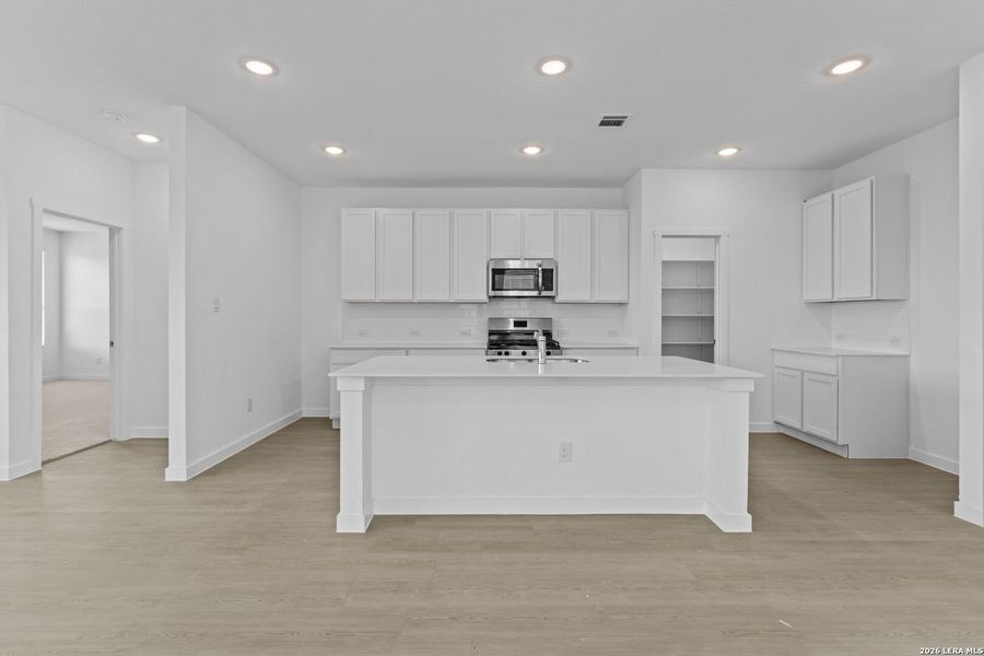 Furnished interior view inside a new home in Waterwheel, San Antonio (Image 7).