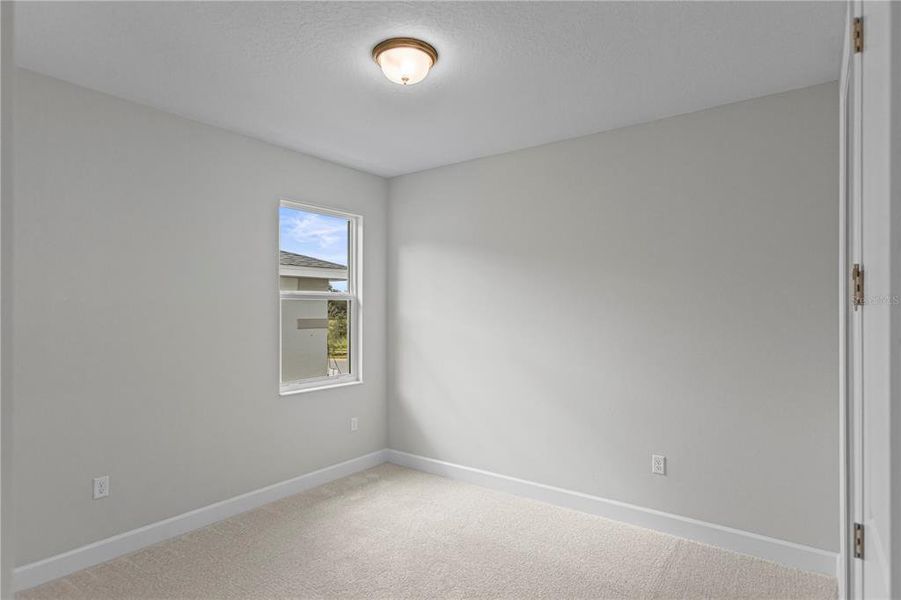 Spacious, unfurnished interior of a new home in Cresswind at Hammock Oaks, Lady Lake (Image 25).