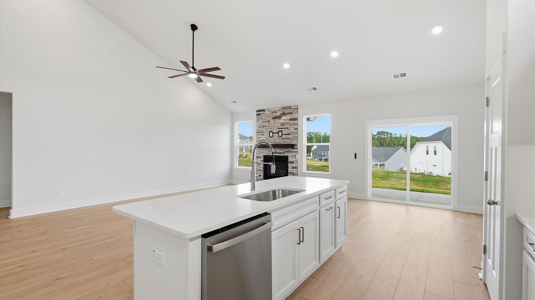 Exceptional culinary space with a striking 9-foot island and eye-catching quartz countertops located in Moore, SC Exceptional culinary space with a striking 9-foot island and eye-catching quartz countertops located in Moore, SC