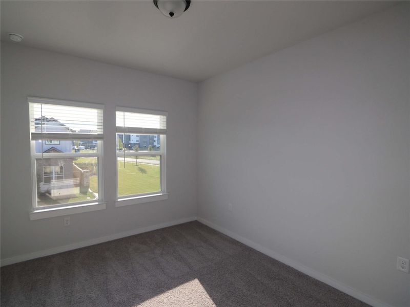 Spacious, unfurnished interior of a new home in Estancia West, Manchaca (Image 13).