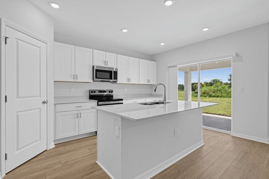 Representative furnished interior of a home built from the Goldfinch by Taylor Morrison in Solena, North Fort Myers (Image 5). Representative furnished interior of a home built from the Goldfinch by Taylor Morrison in Solena, North Fort Myers (Image 5).