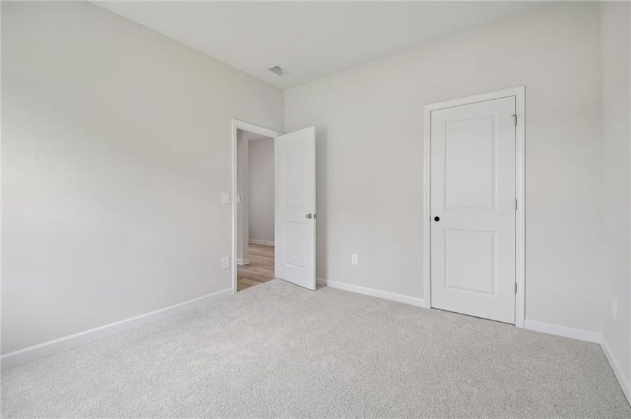 Spacious, unfurnished interior of a new home in Northwoods at Mirror Lake, Villa Rica (Image 22).