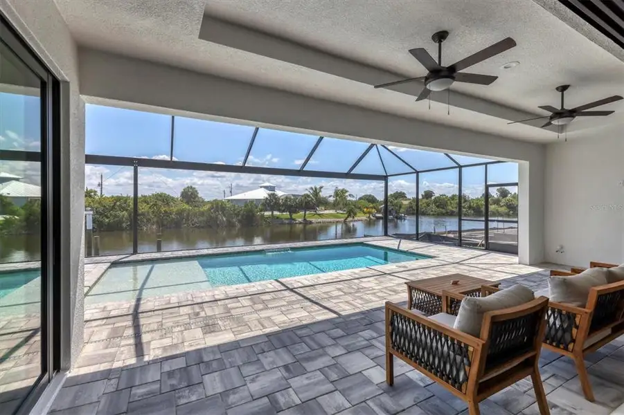 Exterior details and patio area of a home in , Port Charlotte (Image 2).