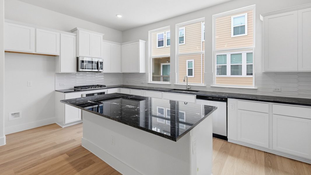 Furnished interior view inside a new home in Collin Creek, Plano (Image 31).