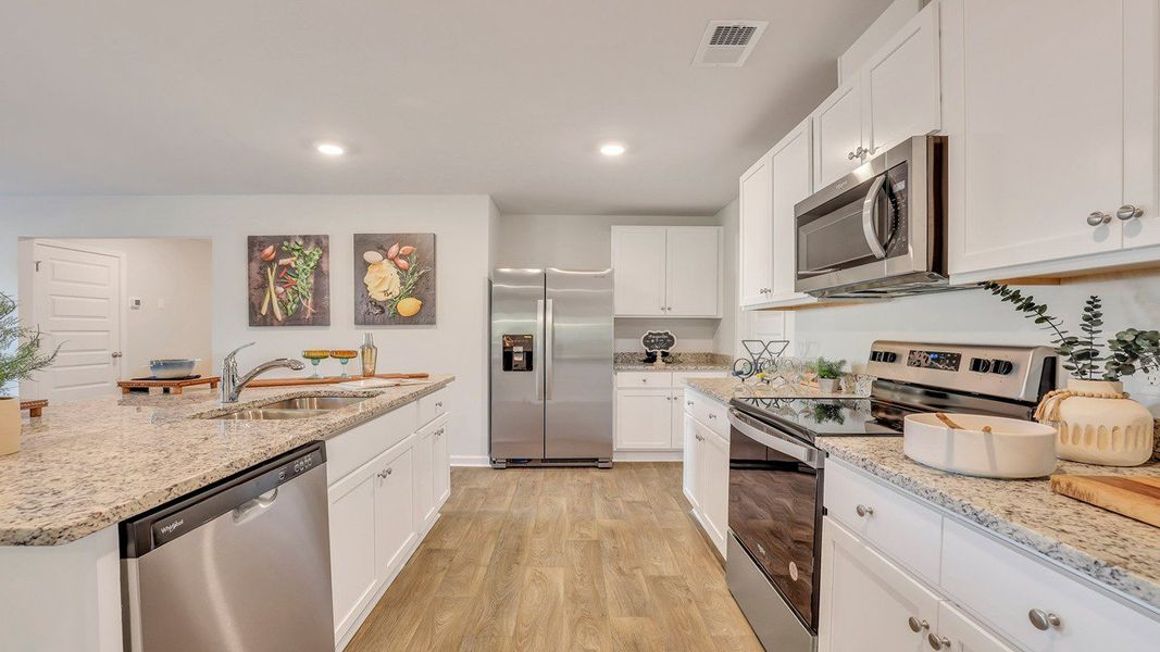 Representative furnished interior of a home built from the ROBIE by D.R. Horton in Longleaf Village, Rincon (Image 9).