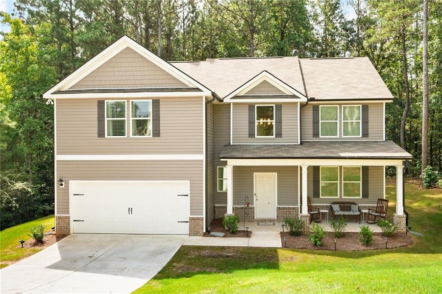 Front exterior of a new home in , Dallas, GA, highlighting curb appeal (Image 2).