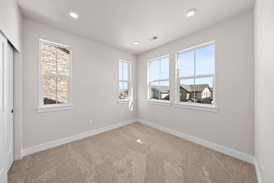 Spacious, unfurnished interior of a new home in Trumark Homes at Sterling Ranch, Littleton (Image 15).
