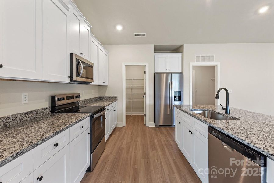 Furnished interior view inside a new home in Ascot Woods, Charlotte (Image 5).