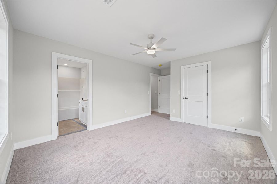 Also features an attached private bathroom.