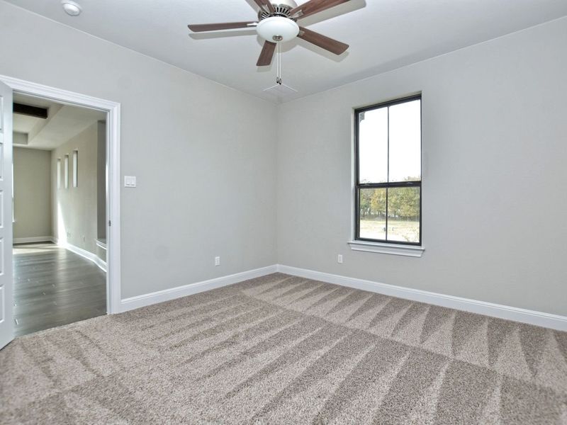 Representative unfurnished interior of a home built from the Madera II by Giddens Homes in Scofield Farms Estates, Georgetown (Image 313).