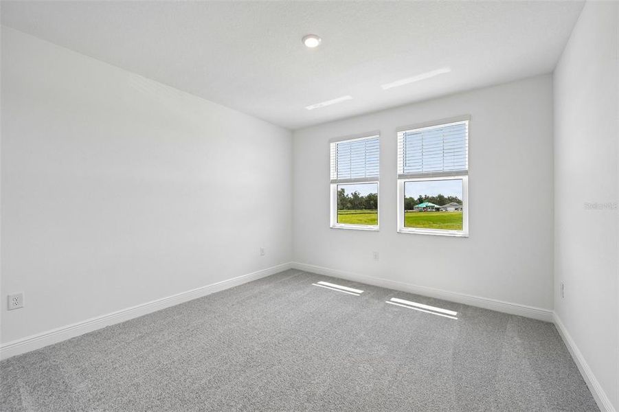 Spacious, unfurnished interior of a new home in Creeks Edge at Twin Rivers, Parrish (Image 25).