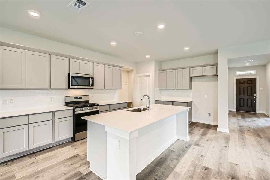 Furnished interior view inside a new home in Prestige Collection at Overland Grove, Forney (Image 6).