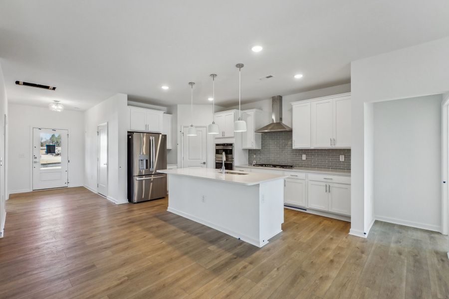 Representative furnished interior of a home built from the Macon by Ashton Woods in Rowland's Grant, Fuquay Varina (Image 16).
