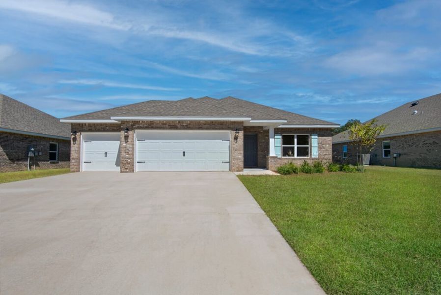Representative exterior photo of a completed home built from the Destin by Holiday Builders in Yellow River Ranch, Milton, FL (Image 9). Representative exterior photo of a completed home built from the Destin by Holiday Builders in Yellow River Ranch, Milton, FL (Image 9).