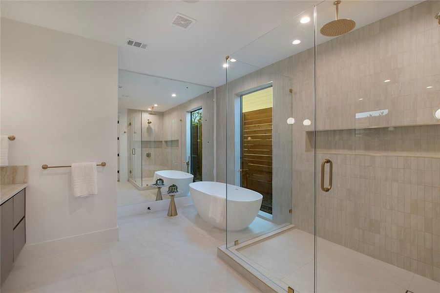 Bathroom with plus walk in shower, vanity, and tile patterned floors