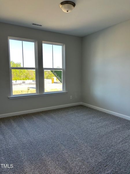 Spacious, unfurnished interior of a new home in Tobacco Road, Angier (Image 48).