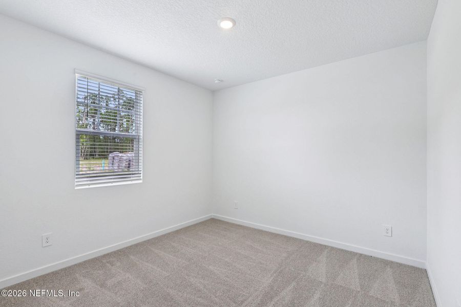 Spacious, unfurnished interior of a new home in Flagler Village - Signature Series, Palm Coast (Image 18).