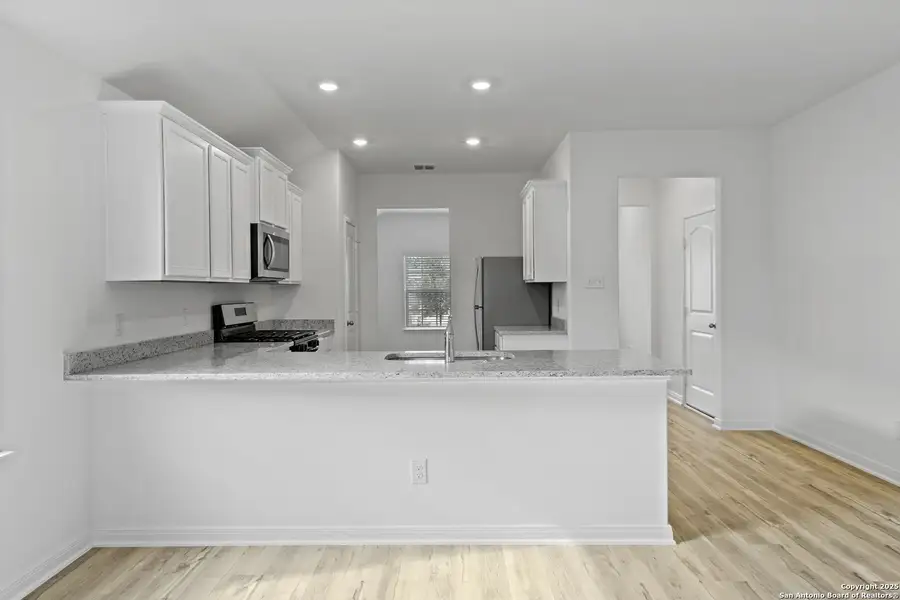 Furnished interior view inside a new home in Preserve at Medina, Von Ormy (Image 5).
