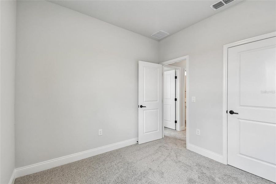 Spacious, unfurnished interior of a new home in Oakfield at Mount Dora Village Series, Mount Dora (Image 39).